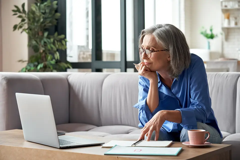 Older white woman at computer