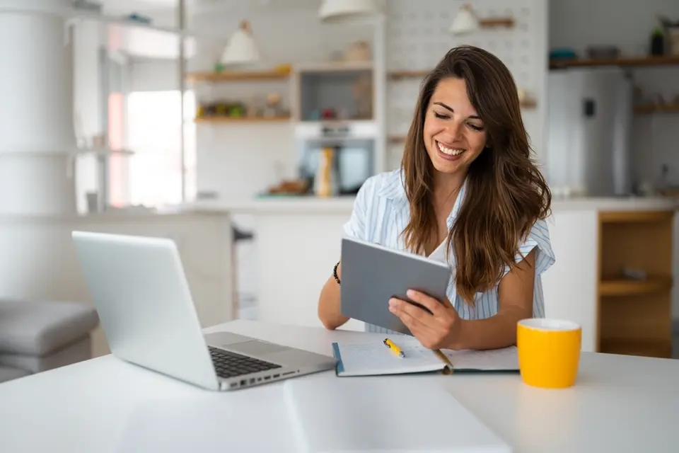 Younger white woman at computer